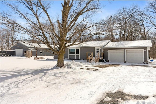 ranch-style home with a garage