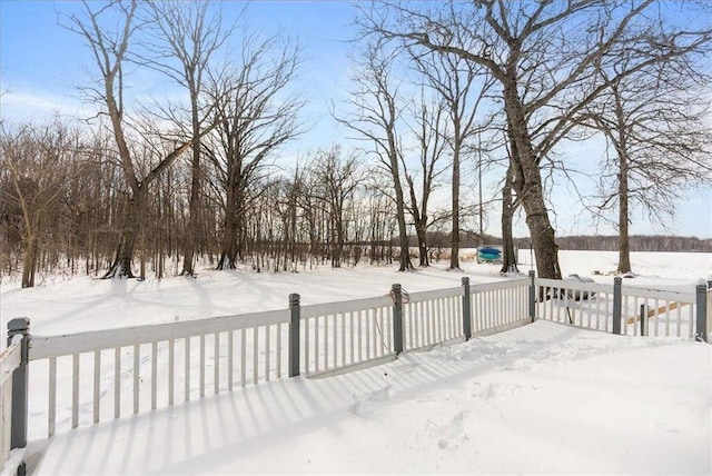 view of yard layered in snow