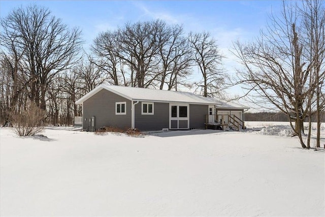 view of snow covered property