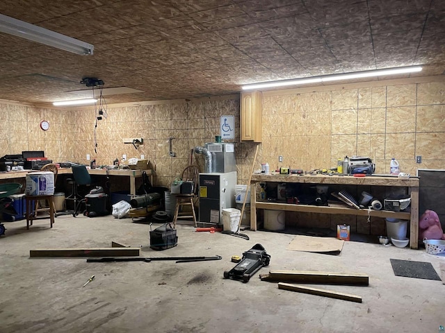 garage with a workshop area