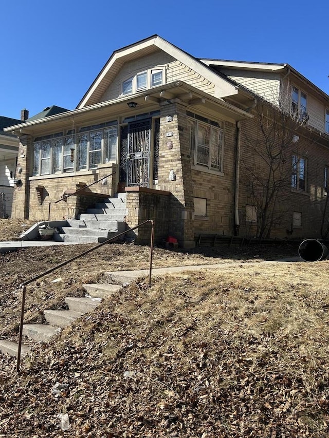 view of front of property with brick siding