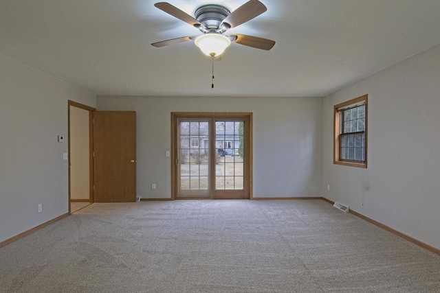 420 14th St, Baraboo, WI 53913 - carpeted spare room with a ceiling fan, visible vents, and baseboards