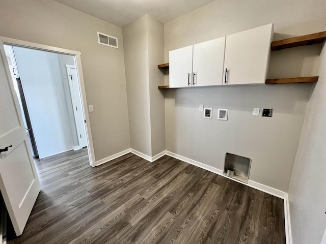 washroom featuring hookup for a washing machine, hookup for an electric dryer, visible vents, cabinet space, and dark wood finished floors