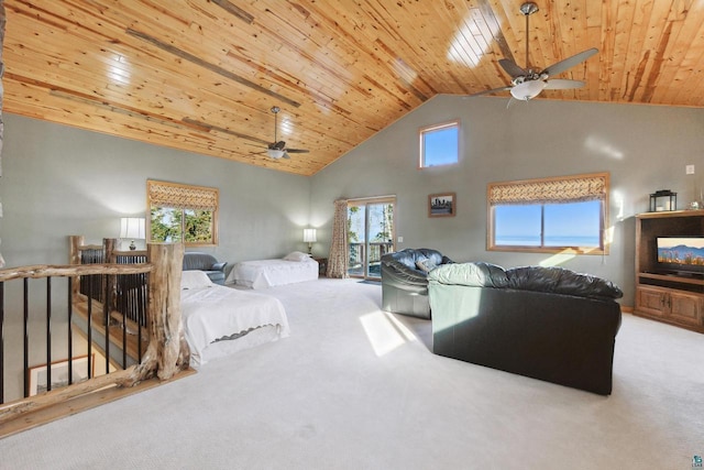 carpeted bedroom featuring high vaulted ceiling, wood ceiling, and ceiling fan