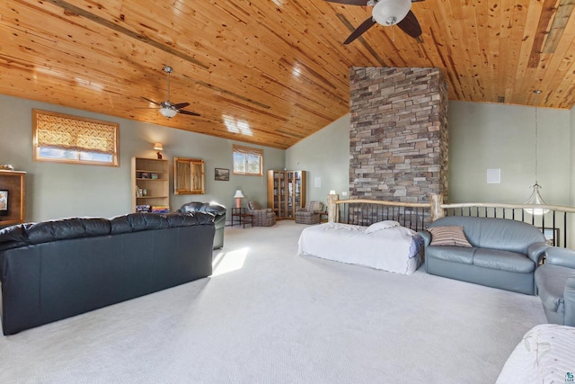 carpeted living area featuring lofted ceiling, wood ceiling, and a healthy amount of sunlight