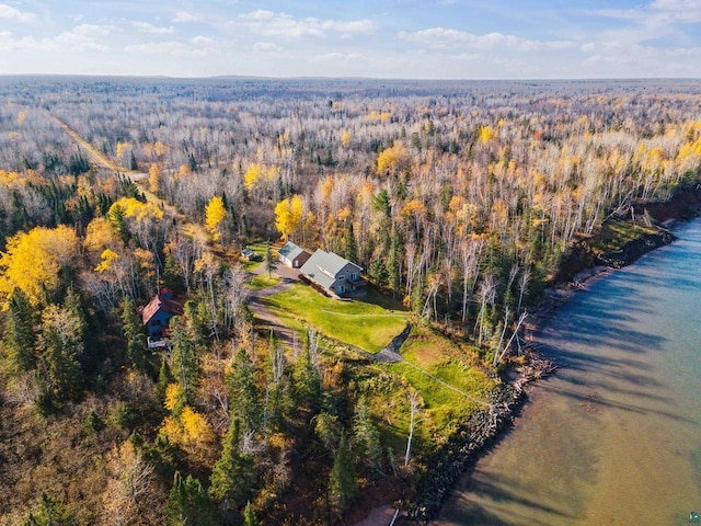 aerial view featuring a water view and a forest view