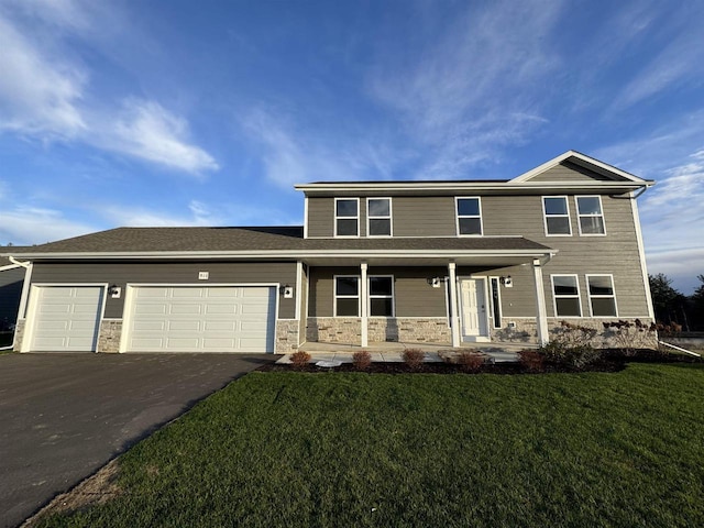 view of front of house with a garage, stone siding, aphalt driveway, a front lawn, and a porch