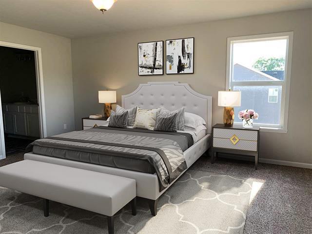 carpeted bedroom featuring baseboards