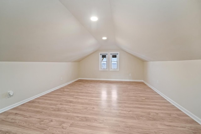 N8648 Linden Beach Rd, Fond Du Lac, WI 54937 - bonus room featuring vaulted ceiling, light wood finished floors, baseboards, and recessed lighting