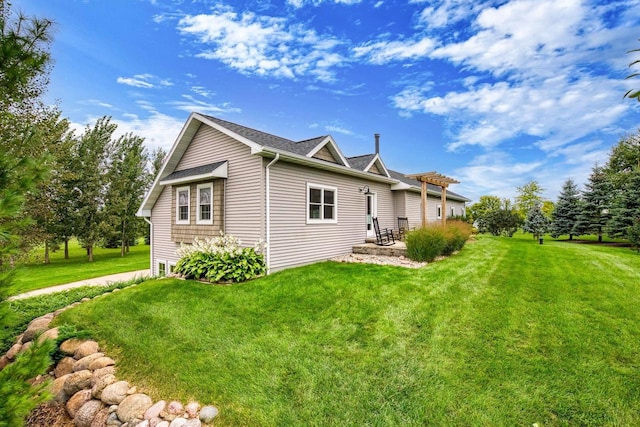 view of home's exterior with a lawn