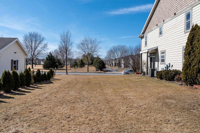 view of yard with central AC