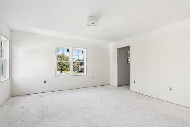 empty room featuring plenty of natural light