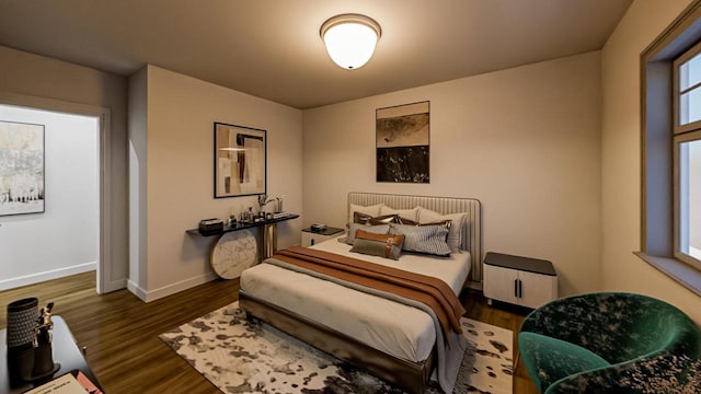 bedroom featuring baseboards and wood finished floors