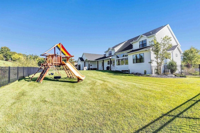 exterior space featuring a yard and a fenced backyard