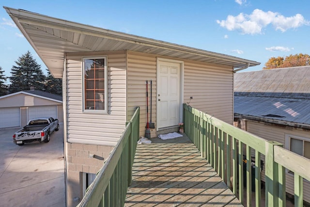 view of exterior entry with a garage