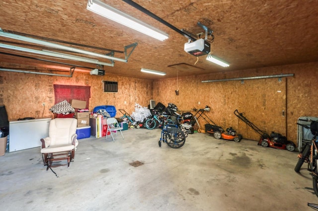 garage featuring a garage door opener