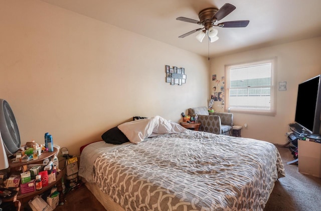 carpeted bedroom with a ceiling fan