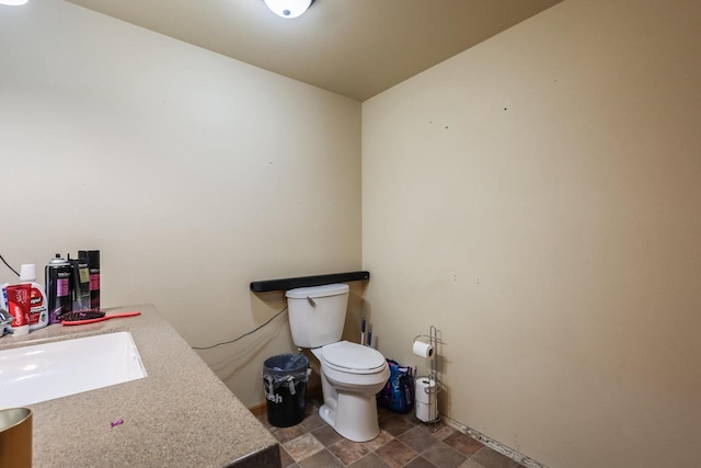 bathroom featuring a sink and toilet