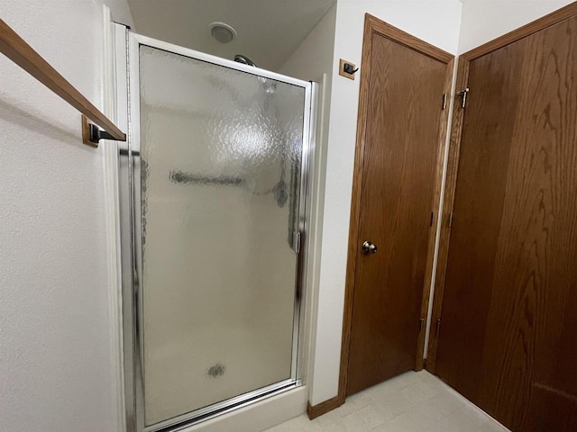 bathroom featuring a stall shower