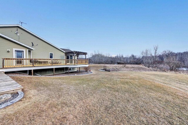 view of yard featuring a wooden deck