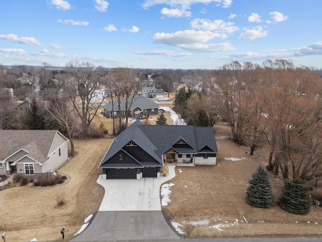 birds eye view of property with a residential view