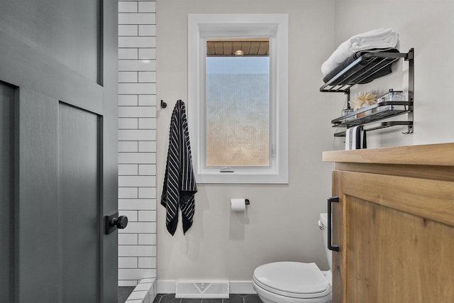 bathroom with visible vents, baseboards, toilet, tile patterned flooring, and vanity