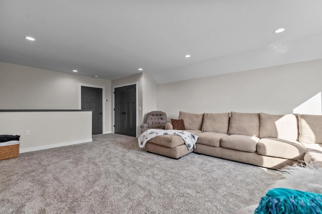 living area with carpet floors, baseboards, and recessed lighting