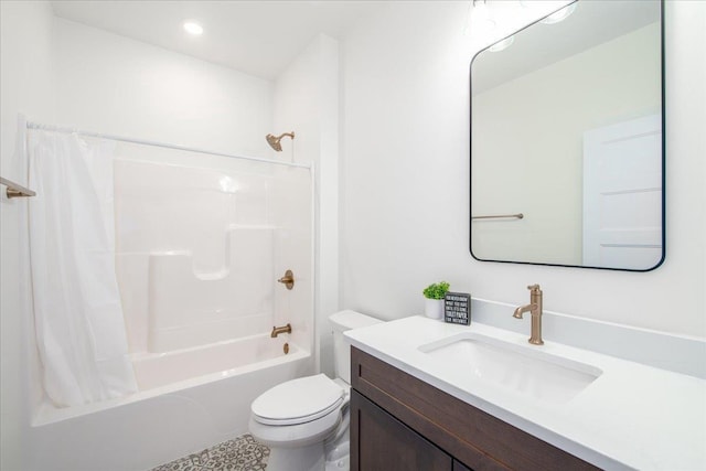 bathroom with vanity, toilet, and shower / bath combo with shower curtain