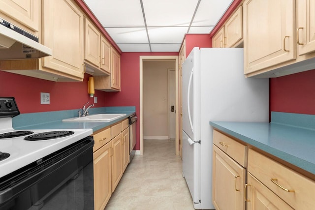 kitchen featuring freestanding refrigerator, light brown cabinetry, a paneled ceiling, black range with electric cooktop, and a sink