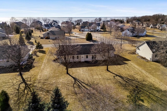 birds eye view of property with a residential view