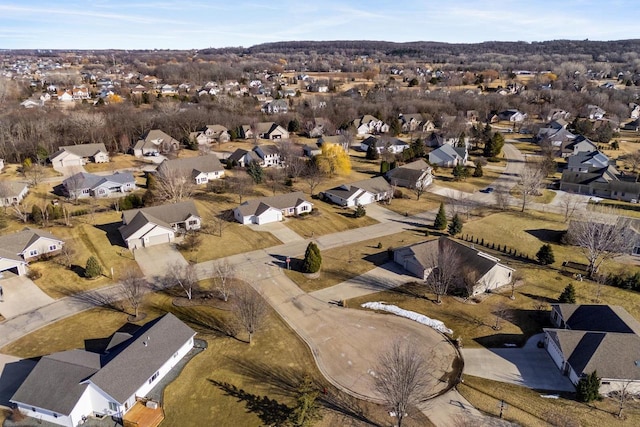 birds eye view of property with a residential view