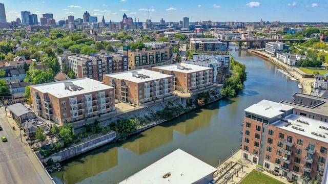 aerial view featuring a water view and a view of city