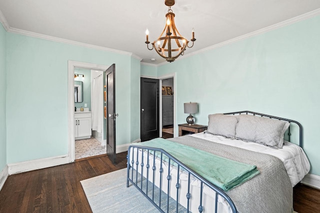 bedroom with a chandelier, crown molding, baseboards, and wood finished floors