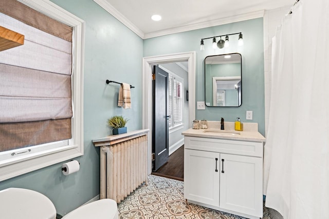 full bath featuring toilet, recessed lighting, vanity, radiator heating unit, and crown molding