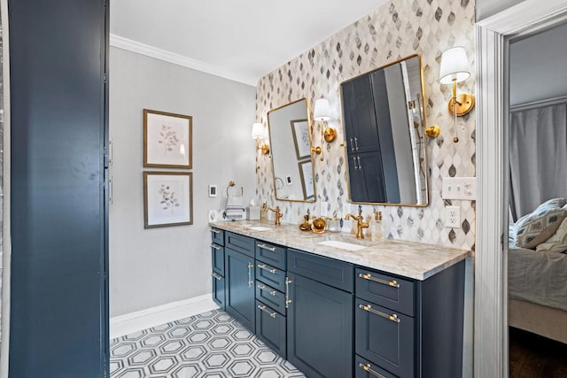 ensuite bathroom featuring double vanity, wallpapered walls, baseboards, ensuite bathroom, and a sink