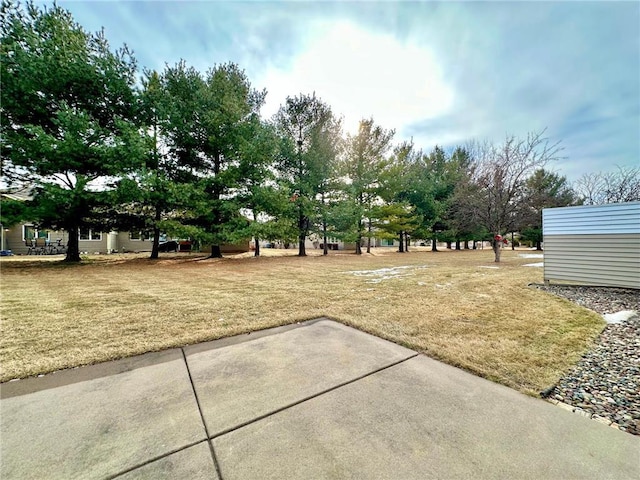 546 Williamsburg Pl, New Richmond, WI 54017 - view of green lawn with a patio area