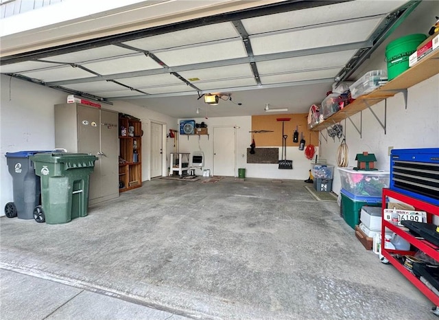 garage featuring a garage door opener