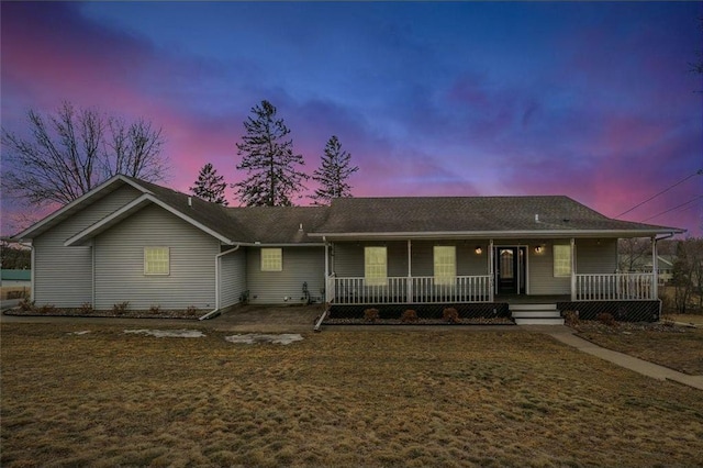 single story home featuring covered porch