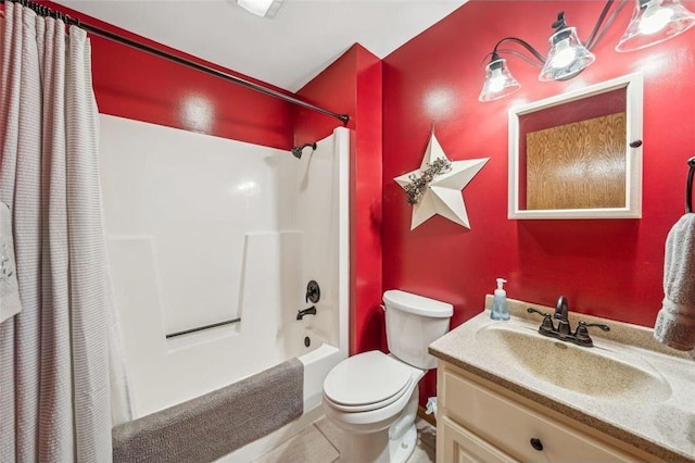 bathroom featuring shower / bath combo, vanity, and toilet