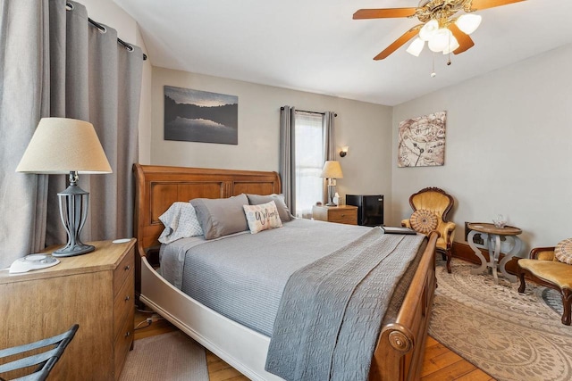 bedroom featuring ceiling fan and wood finished floors