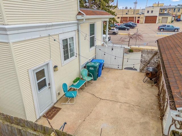 view of patio featuring fence