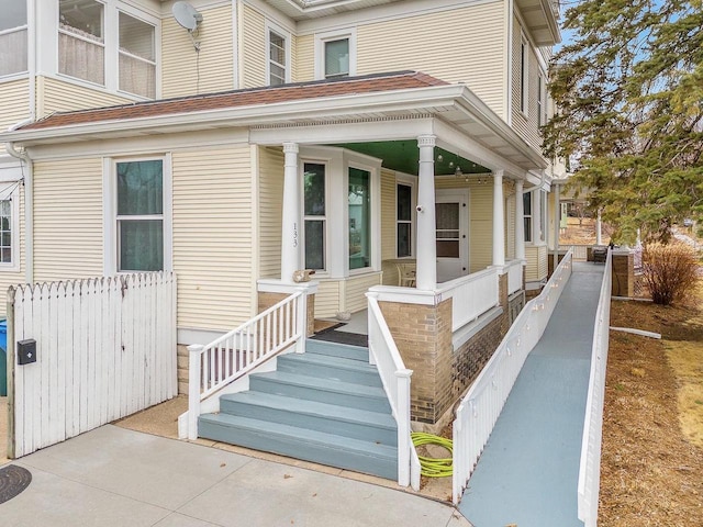 doorway to property with a porch