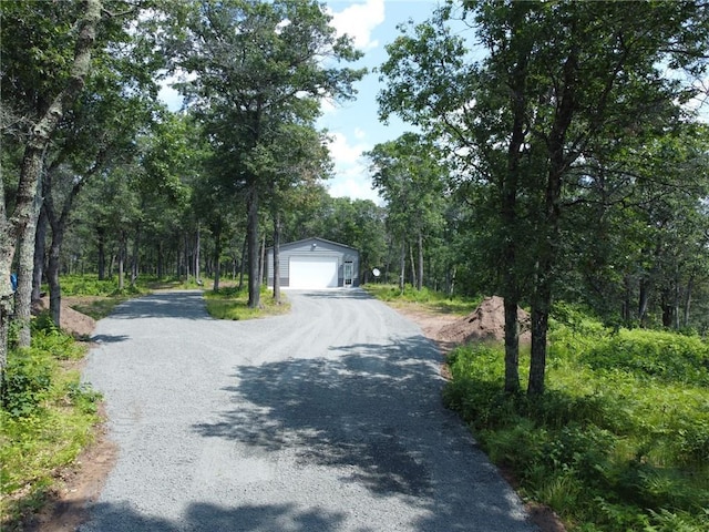 view of road with driveway