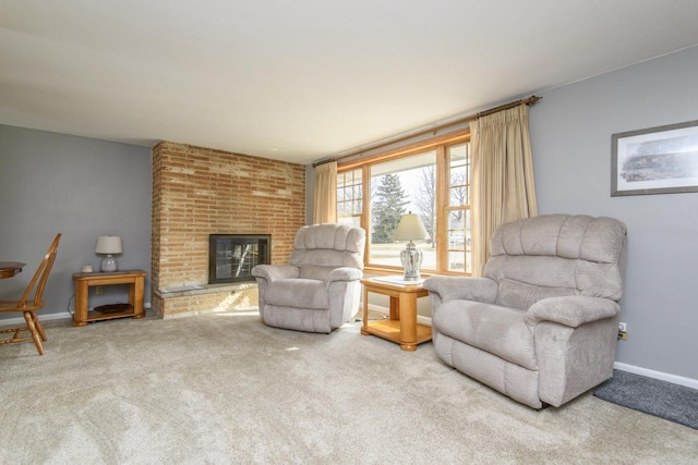 living area featuring a brick fireplace, carpet flooring, and baseboards