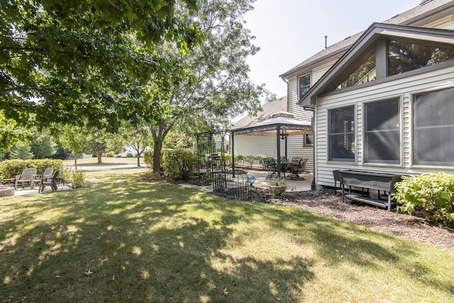 view of yard featuring a patio and a gazebo