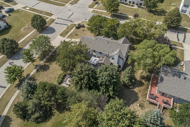 birds eye view of property with a residential view