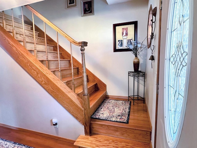 stairway with baseboards