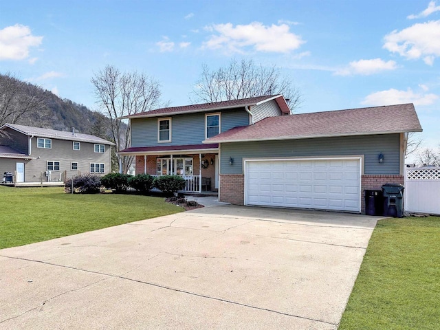 traditional home featuring driveway, an attached garage, covered porch, a front lawn, and brick siding