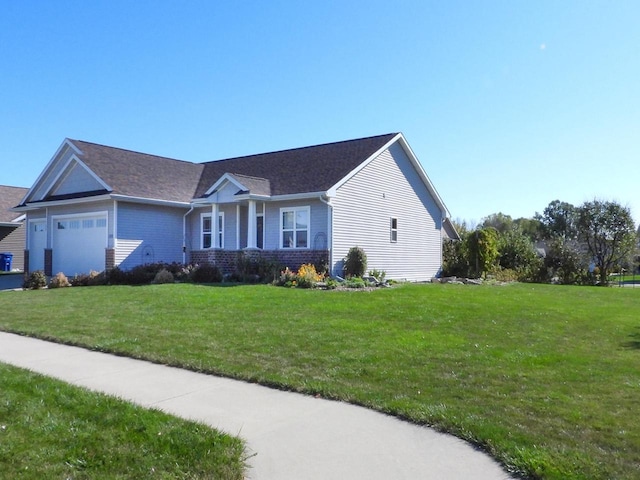 single story home with a garage, brick siding, and a front yard