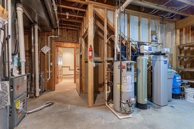 unfinished basement featuring water heater